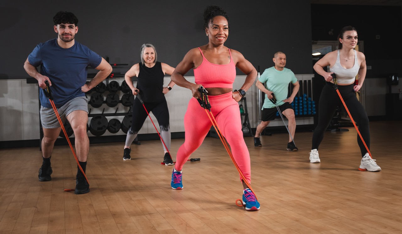 A group of members take part in a class at a GoodLife Fitness studio.
